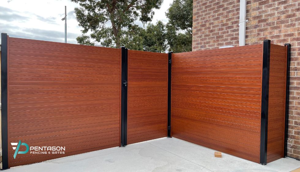 timber front fence with pedestrian access gate installed by Pentagon Fencing & Gates in Melbourne