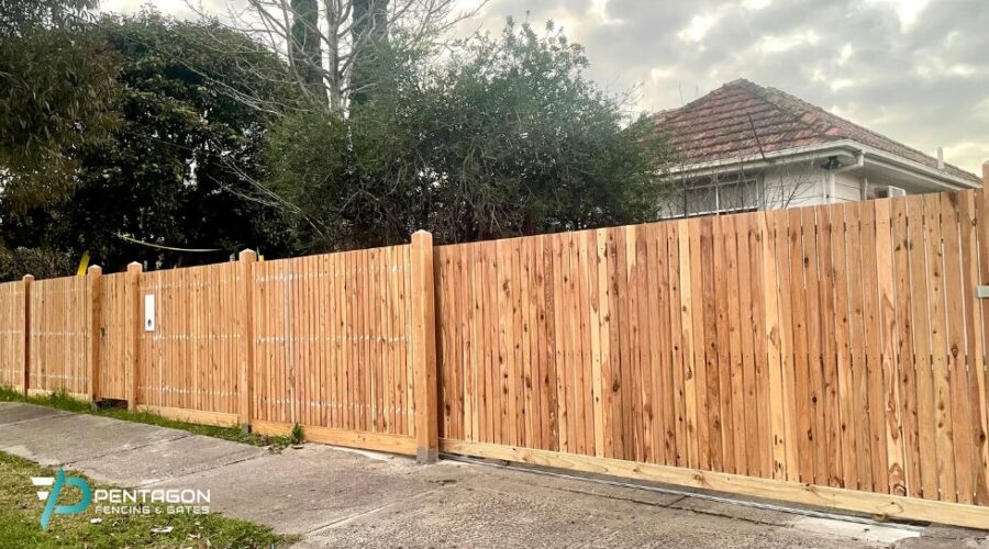 cedar timber front fence with automatic sliding gate - cedar fence - wood fence ideas for Melbourne homes - timber picket fence