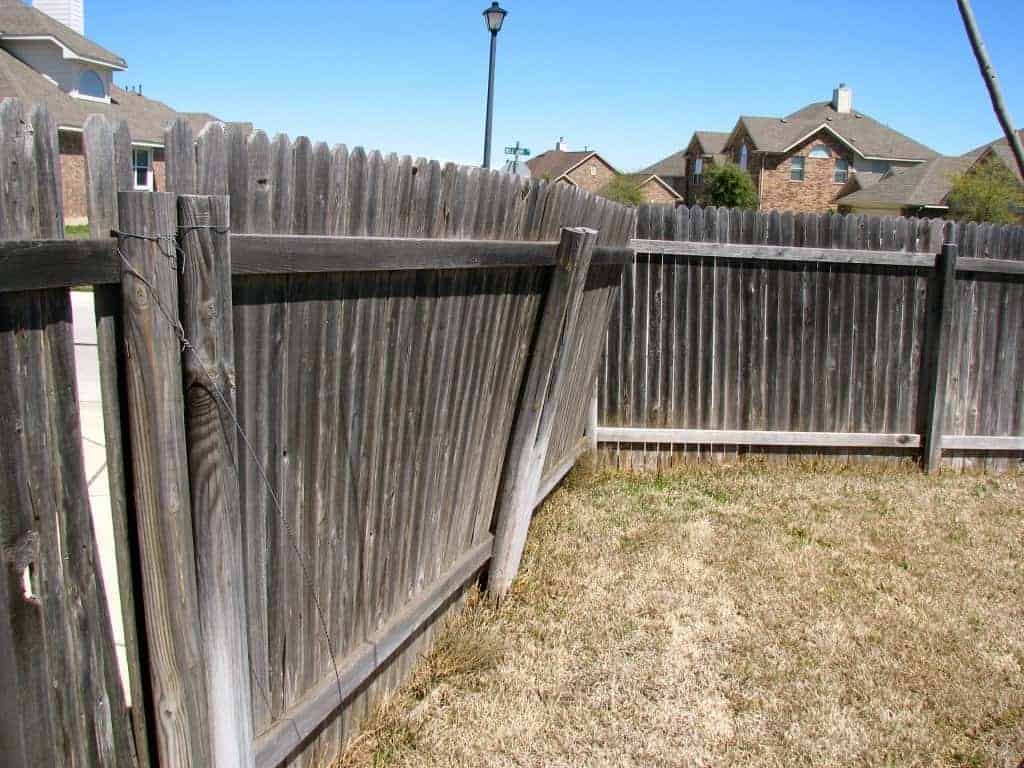 Broken Post Leaning Fence