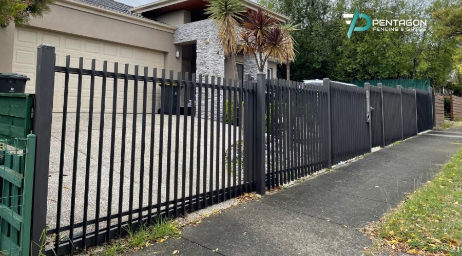 aluminium vertical blade fencing with automatic gate installed by Pentagon fencing & gates in Melbourne