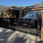 aluminium vertical blade sliding gate installation in melbourne