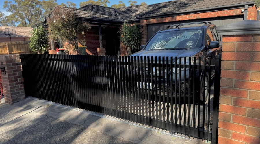 aluminium vertical blade sliding gate installation in melbourne
