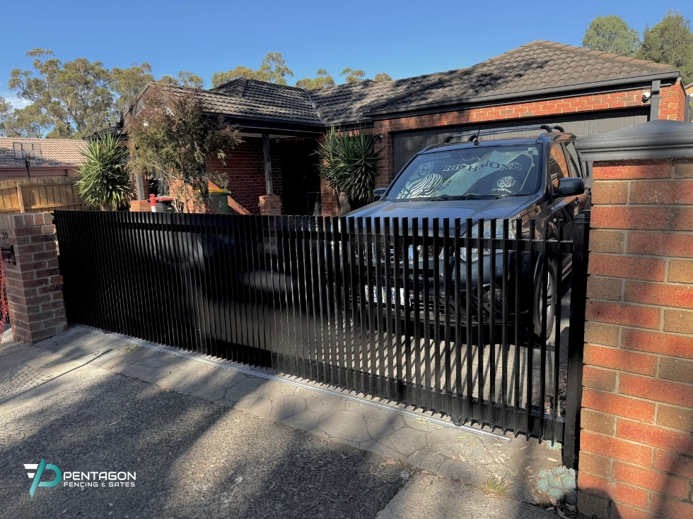 aluminium vertical blade sliding gate installation in melbourne