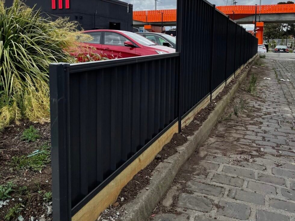 Commercial job Best fencing contractor in Melbourne colorbond fence and gates pentagon fencing and gates Fence Timber fence Steel fence scaled e1779263999644