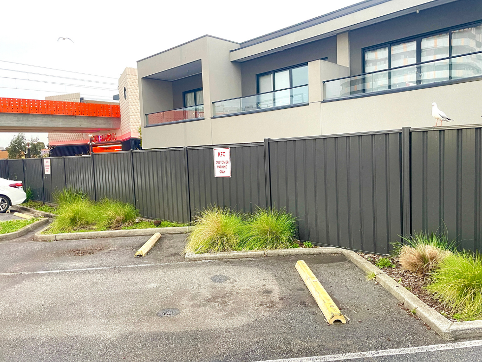 Colorbond fencing installation in Coburg Melbourne for commercial project
